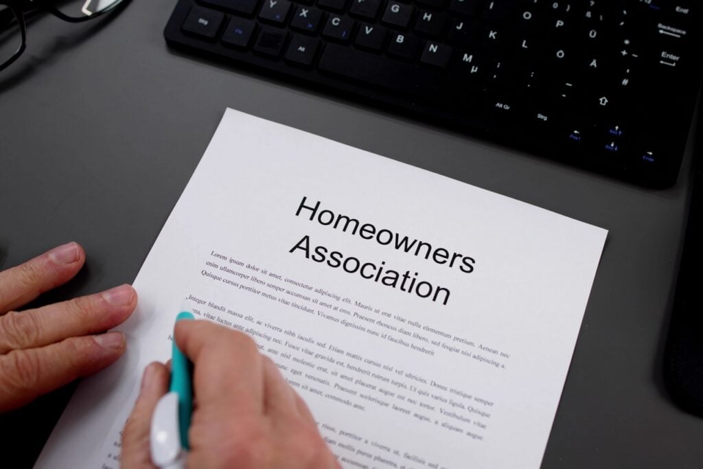 Condo Owner Faces Monthly Fines Over Pre-Existing Flooring Dispute